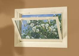 Hopper window on beige wall