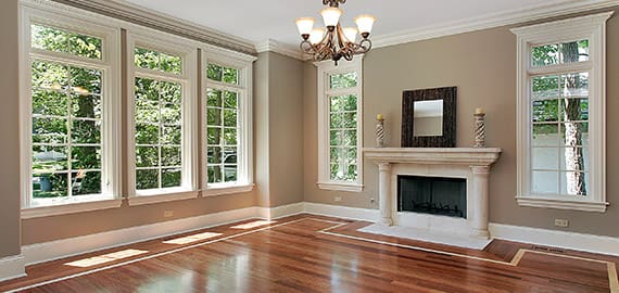 Double Hung windows in a room with a fireplace