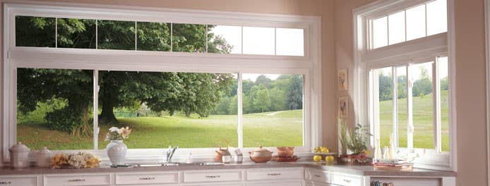 wide wraparound sliding windows in a kitchen